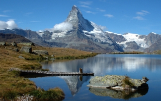 Reflection of the Matterhorn in the mountain lake Riffelsee 